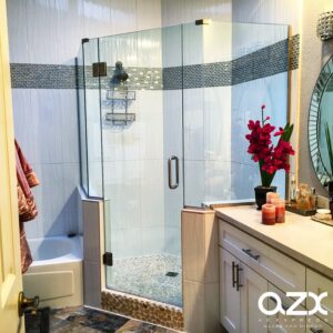 A Frameless Shower Space With White Tiles